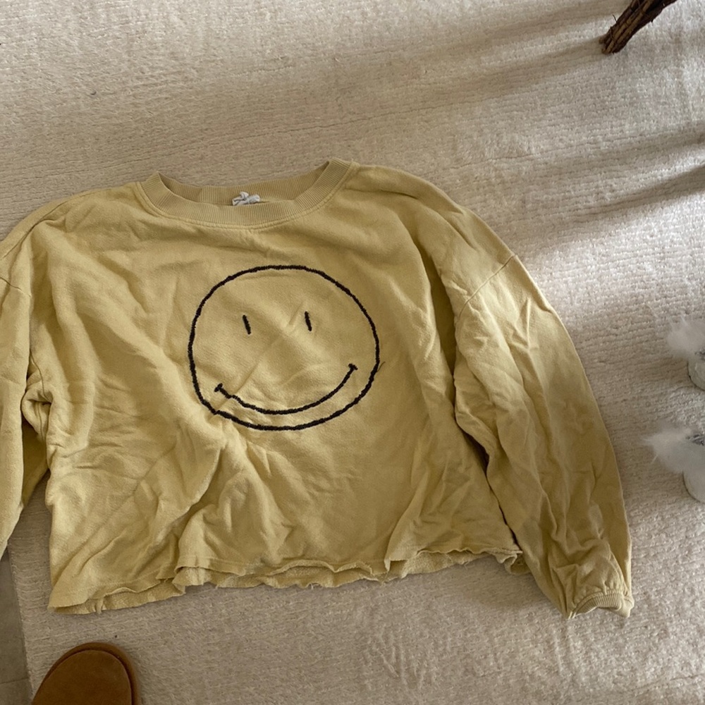 cropped smiley face sweatshirt